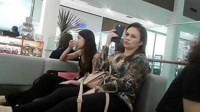 m.i.l.f relieving her soles on the table