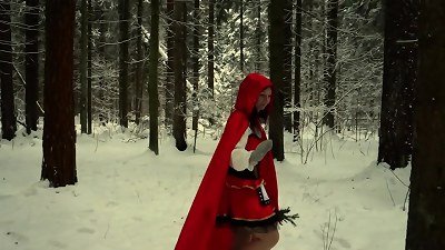 crimson spandex hood in the snowy forest