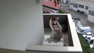 Spying my teenager neighbour masturbating on her balcony